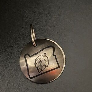 Dog tag • approximately 1”